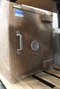 A metal safe with key