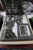 Four albums of postcards and monochrome photographs