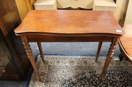 A nineteenth century mahogany tea table CONDITION REPORT: Legs rather wobbly.