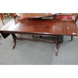 A reproduction mahogany coffee table