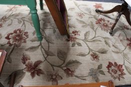 A contemporary deep pile floral carpet CONDITION REPORT: 293cm by 201cm