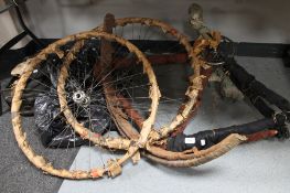 A dismantled mid century bicycle frame