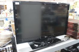 An LG 32~" LCD TV with remote