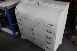 A reproduction painted white cylinder bureau.