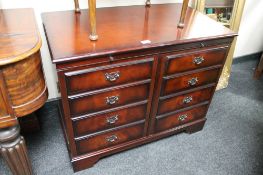 A reproduction mahogany audio cabinet containing Sony hifi system and disc player