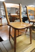 A set of six nineteenth century elm kitchen chairs CONDITION REPORT: These are a