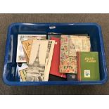 A box of various loose postcards and postcard albums,