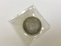 A George VI Indian One Rupee coin 1938