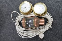 A copper miniature electric lamp together with a brass barometer and wall clock