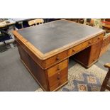 A Victorian mahogany partner's desk