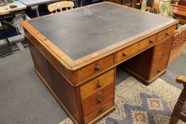 A Victorian mahogany partner's desk