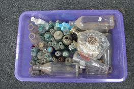 A box of antique and later glass bottles