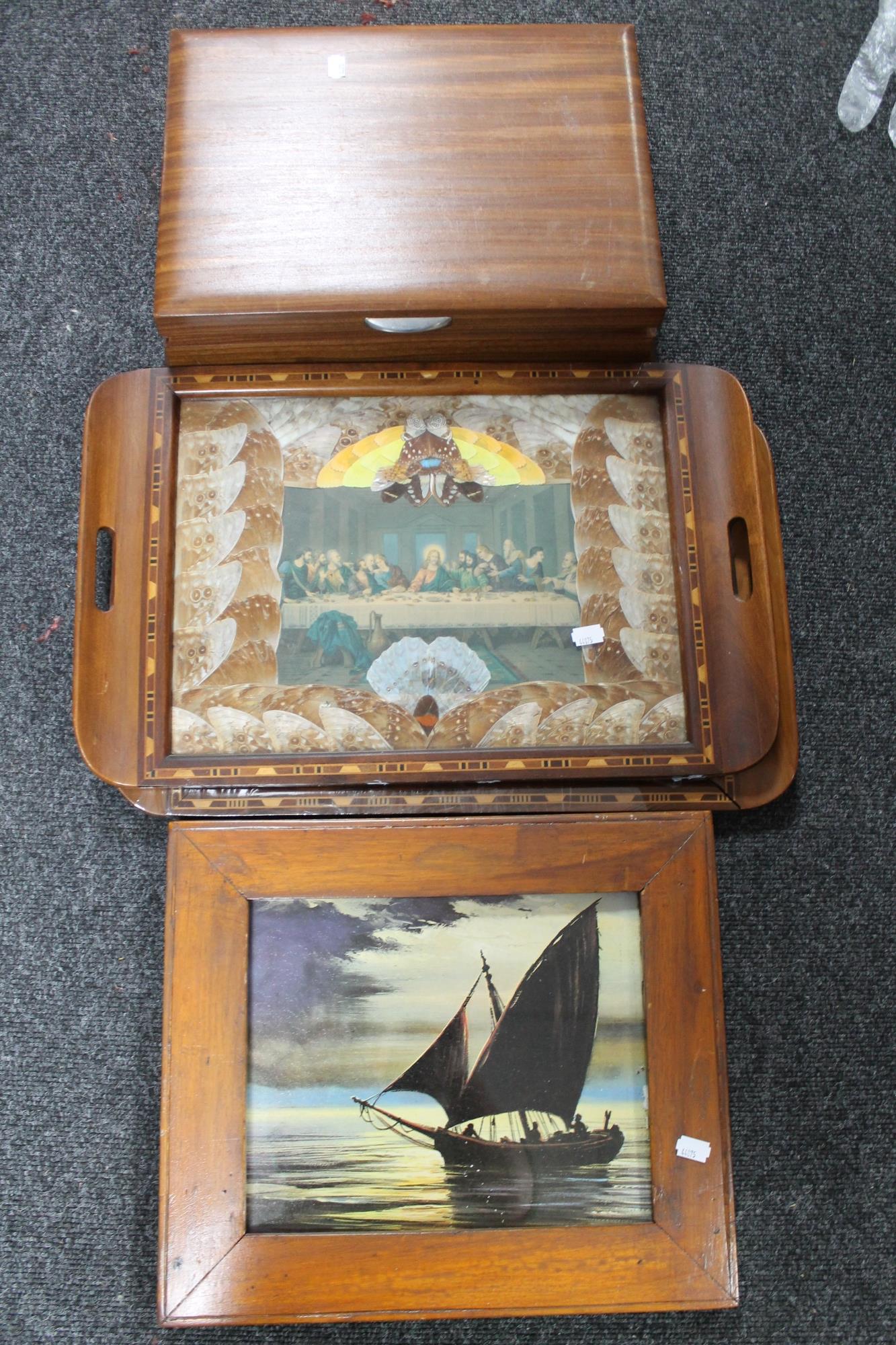 A teak cutlery box together with two inlaid butterfly trays,