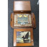 A teak cutlery box together with two inlaid butterfly trays,