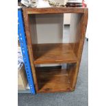 A hardwood book stand, height 92 cm, 48 cm width and 40.5 cm depth.