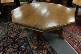 A good quality Edwardian oak octagonal library table, width 150 cm.