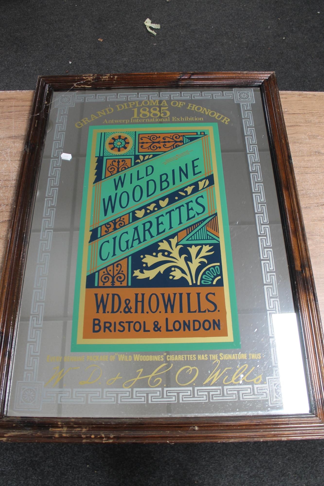 An advertising mirror - wild woodbine cigarettes