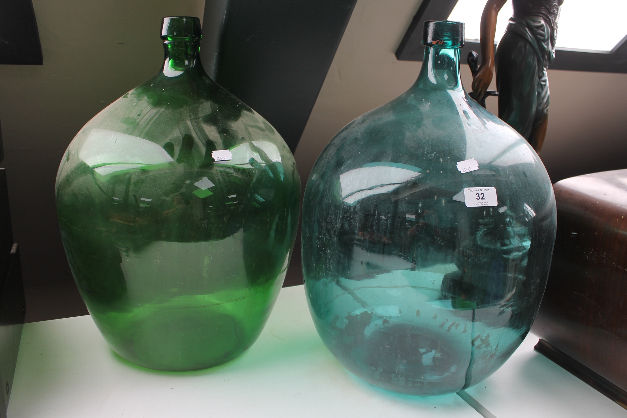 Two glass carbouys