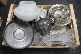 A crate of glass light shade, silver plated items,