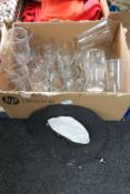 A box of Guinness pub glasses and hat