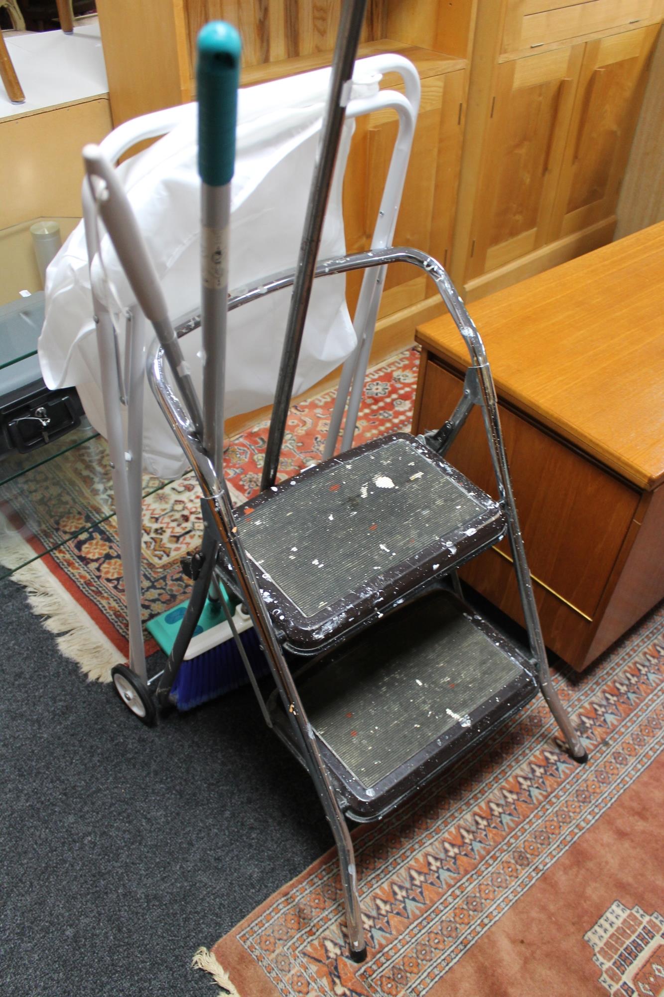 A Corby trouser press together with brush,