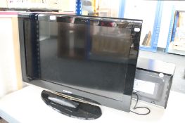 A Samsung 32 inch lcd tv with remote