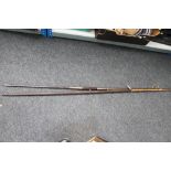A wooden African spear together with a further metal spear