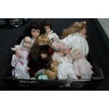 A tray of porcelain headed dolls