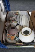 A box of china, decorative plates,