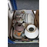 A box of china, decorative plates,