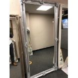 A rectangular silvered mirror 100 cm x 200 cm