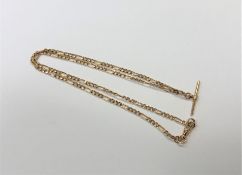 A 9ct gold watch chain with T-bar CONDITION REPORT: 4.