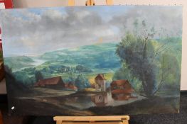 A wooden artist easel and oil painting depicting a landscape