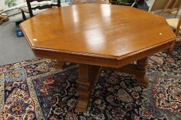 A good quality Edwardian oak octagonal library table, width 150 cm.