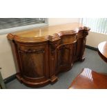 A Victorian mahogany serpentine fronted sideboard,