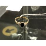 An 18ct gold sapphire and diamond ring, size U CONDITION REPORT: 3.