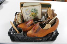 A crate of wooden clogs,