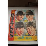 A Beatles scrap book containing press cuttings etc