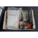A crate of local tourist guides, Geordie phrase booklets,