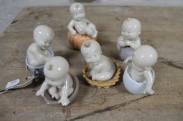 A set of six Nao baby figures