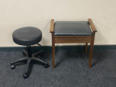 A wooden piano stool with sheet music and swivel stool