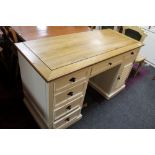 A reproduction painted white pedestal desk