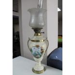 A 19th century ceramic and glass oil lamp