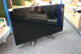 A Philips 32 inch lcd tv with remote (Continental plug,