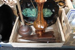 A copper jug and wall pocket,