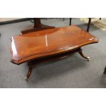 A reproduction mahogany rectangular shaped coffee table, width 122 cm.