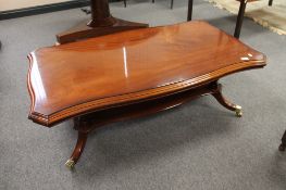 A reproduction mahogany rectangular shaped coffee table, width 122 cm.
