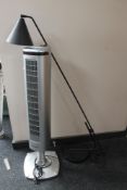 A Comaco floor standing fan together with an angle light