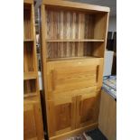 A pine storage bookcase