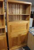 A pine storage bookcase